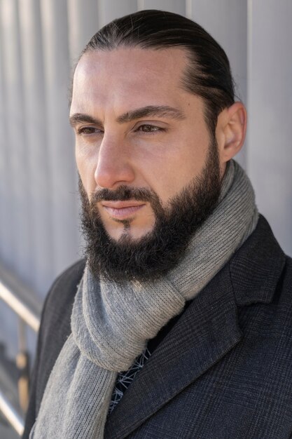 Portrait of attractive man posing outdoors