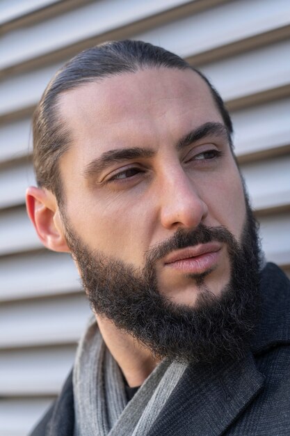 Portrait of attractive man posing outside