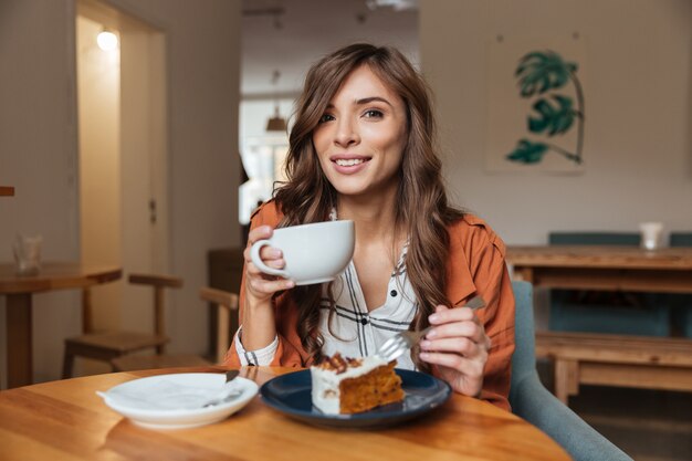 Portrait of an attractive woman eating