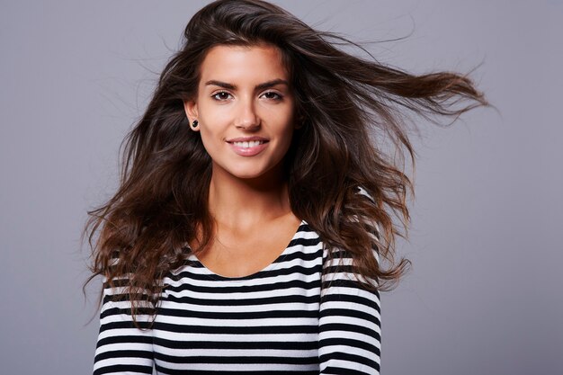 Portrait of attractive woman in the studio