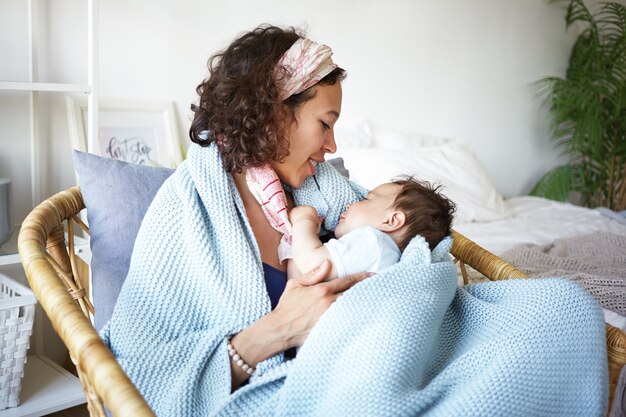 A portrait of a baby boy and mother