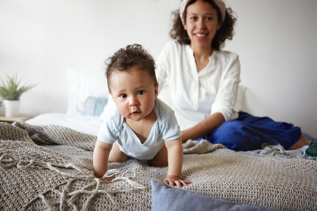 A portrait of a baby boy and mother