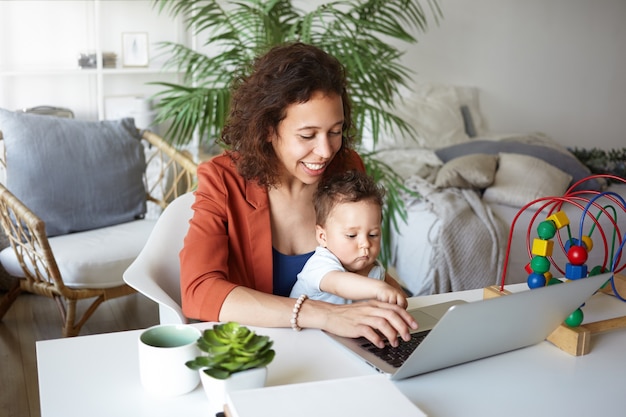 A portrait of a baby boy and mother