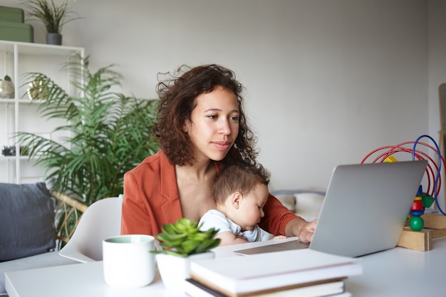 A portrait of a baby boy and mother