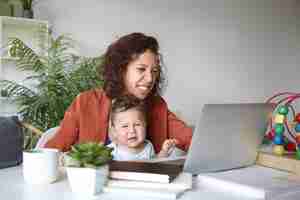 Free photo a portrait of a baby boy and mother