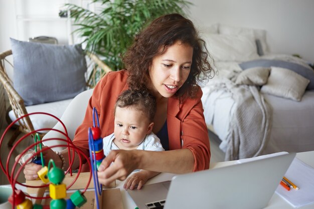 A portrait of a baby boy and mother