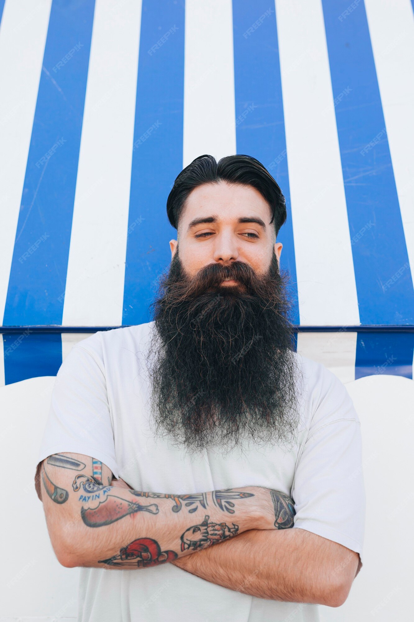 Free Photo | Portrait of a bearded handsome young man with tattoo on his hand Free Photo | Portrait of a bearded handsome young man with tattoo on his hand
