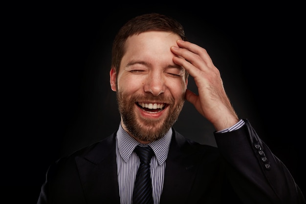 Portrait of bearded man wearing formal clothes