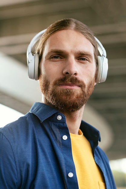 Portrait of bearded man with headphones