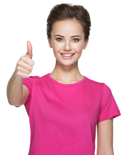 Portrait of a beautiful adult happy woman with thumbs up sign