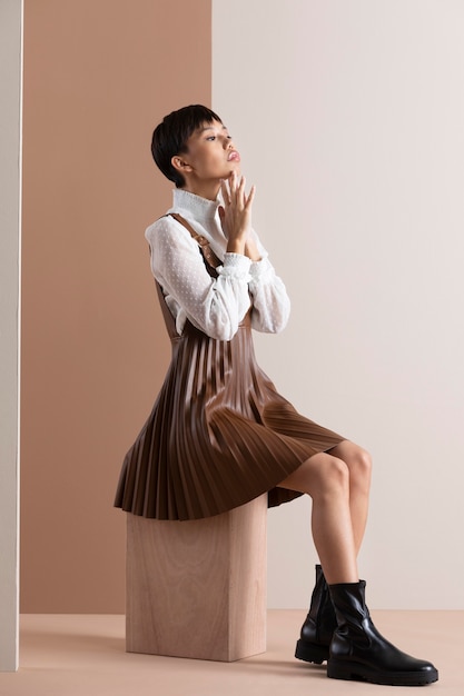 portrait of beautiful asian woman in autumn clothes