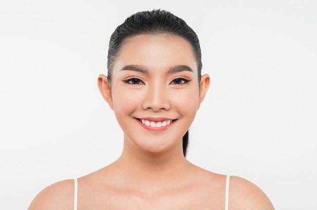 Portrait of beautiful asian woman with black hair and pink lips