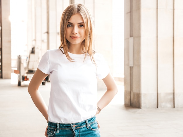 Portrait of beautiful blond model dressed in summer hipster clothes.  