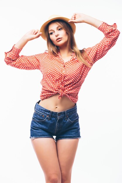 Portrait of beautiful blond woman in straw hat isolated on white background