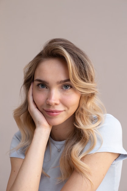 Portrait of beautiful blond woman with trendy hairstyle