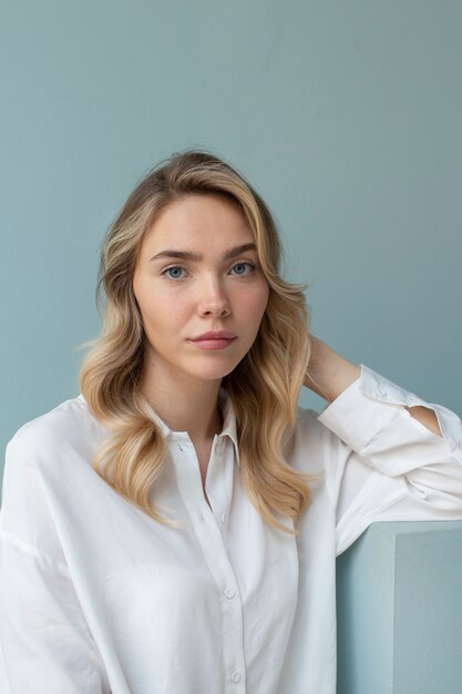 Portrait of beautiful blond woman with trendy hairstyle