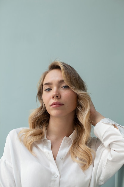 Portrait of beautiful blond woman with trendy hairstyle