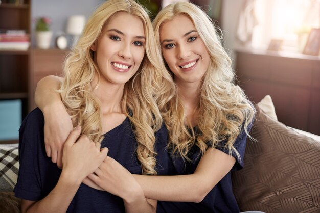 Portrait of beautiful blonde twins