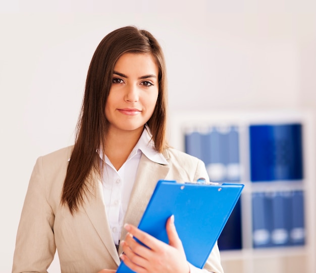 Portrait of beautiful and candid businesswoman