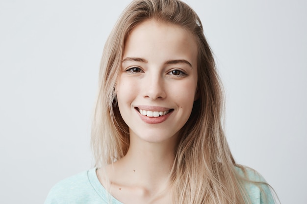 Portrait of beautiful charming young blonde woman