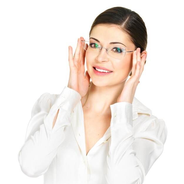 Portrait of the beautiful happy young  woman in glasses and white office shirt- isolated on white background
