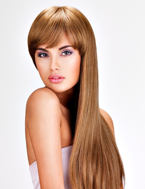 Portrait of a beautiful indian woman with long straight brown  hair.