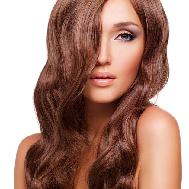 Portrait  of beautiful sexy woman with long red hairs. Closeup face  with curly hairstyle, isolated on white.