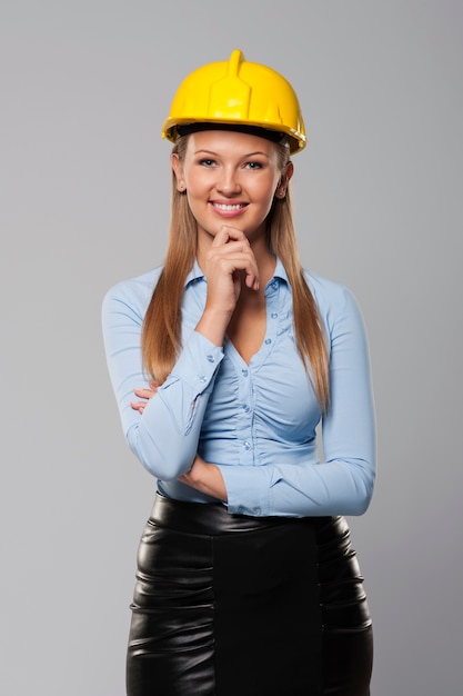 Portrait of beautiful and smiling architect woman
