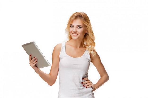 Portrait of beautiful smiling girl with modern laptop