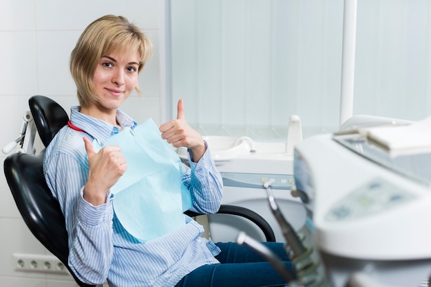 Portrait of beautiful woman at the dentist