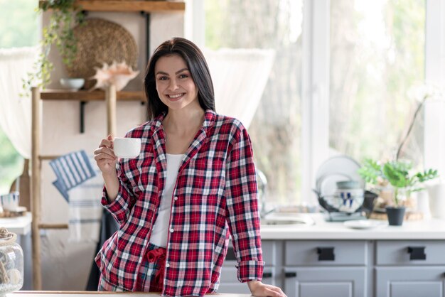 Portrait of beautiful woman enjoying morning