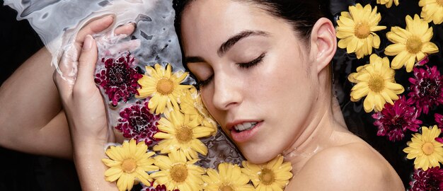 Portrait of beautiful woman enjoying spa treatment