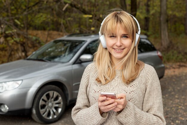 Portrait of beautiful woman listening music