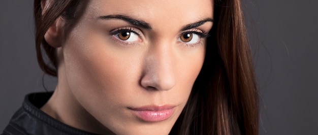 Portrait of beautiful woman model in studio