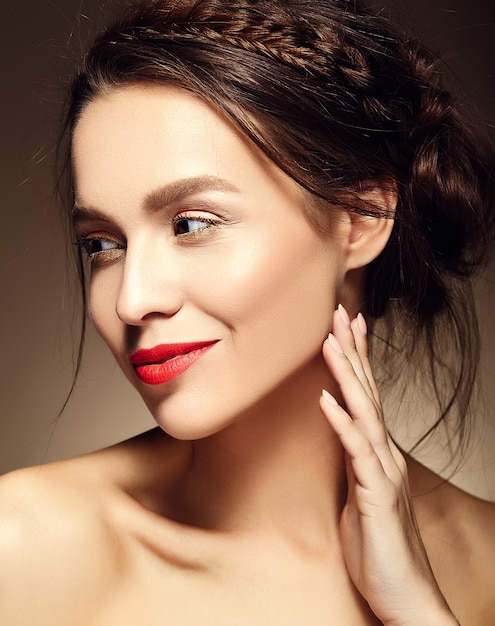 portrait of beautiful woman model with fresh daily makeup and red lips