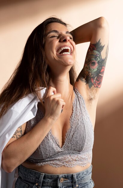 Portrait of beautiful woman posing in her bra