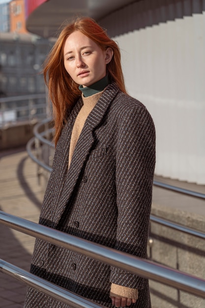 Portrait of beautiful woman posing outdoors