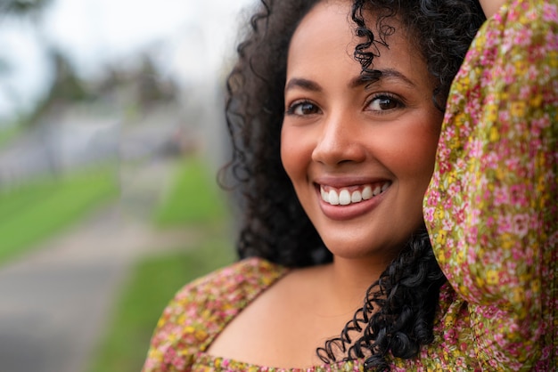 Portrait of beautiful woman posing outdoors