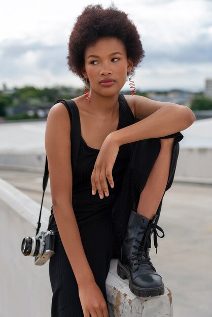 portrait of beautiful woman posing outdoors