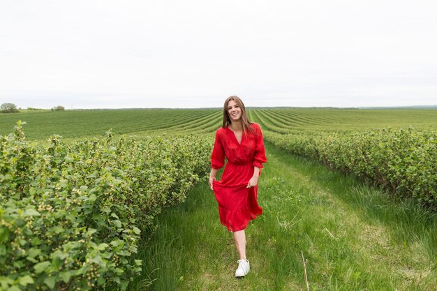 Portrait beautiful woman walking in field