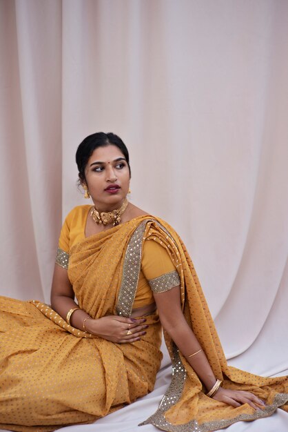 Portrait of beautiful woman wearing traditional sari garment