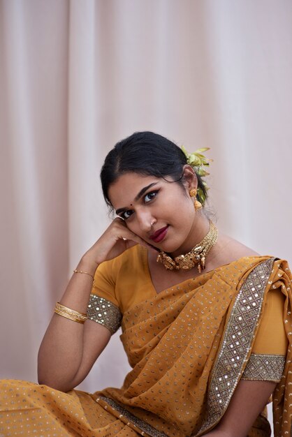 Portrait of beautiful woman wearing traditional sari garment