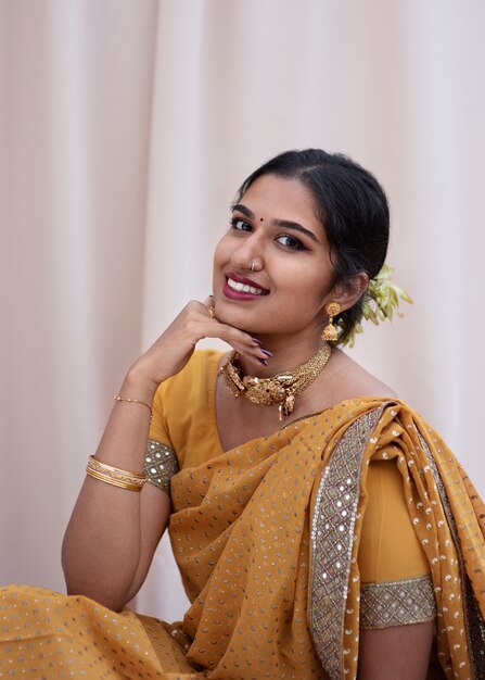 Portrait of beautiful woman wearing traditional sari garment