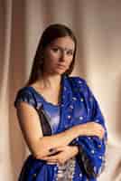 Free photo portrait of beautiful woman wearing traditional sari garment