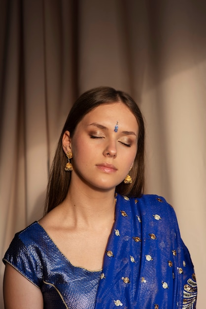 Portrait of beautiful woman wearing traditional sari garment