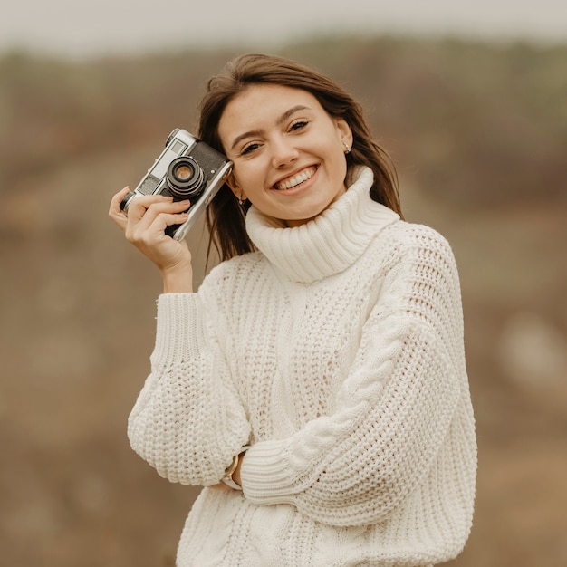 Portrait beautiful woman on winter trip