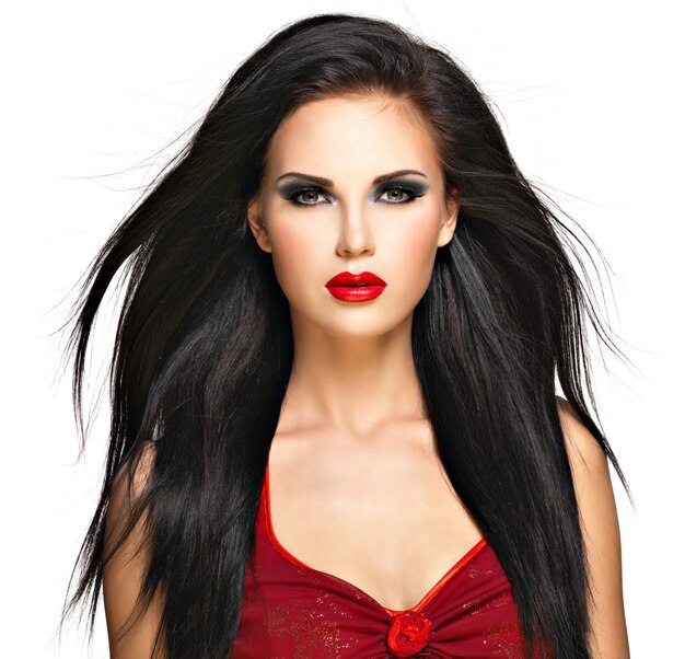 Portrait of  the beautiful woman with  black straight hairs and red lips