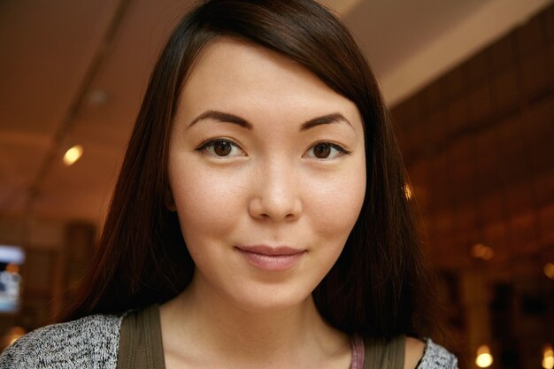 Portrait of beautiful woman with long dark hair