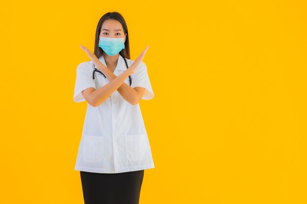 Portrait beautiful young asian doctor woman with mask for protect covid19