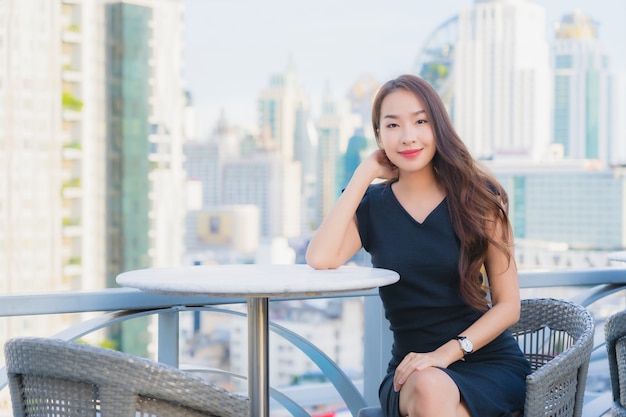 Portrait beautiful young asian woman enjoys with cocktails drink glass